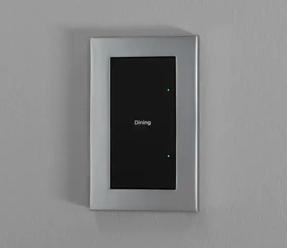 Control4 Lux switch: black glass-look face labelled Dining in a silver-tone metal plate