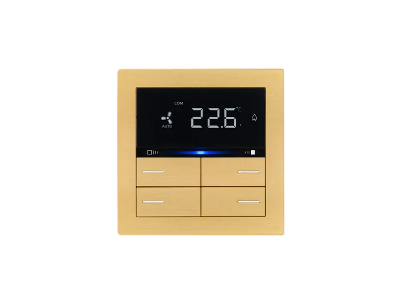 Eelectron OL-U Metal Edition thermostat in a gold-tone metal frame: black display reading 22.6 above four gold-tone keys