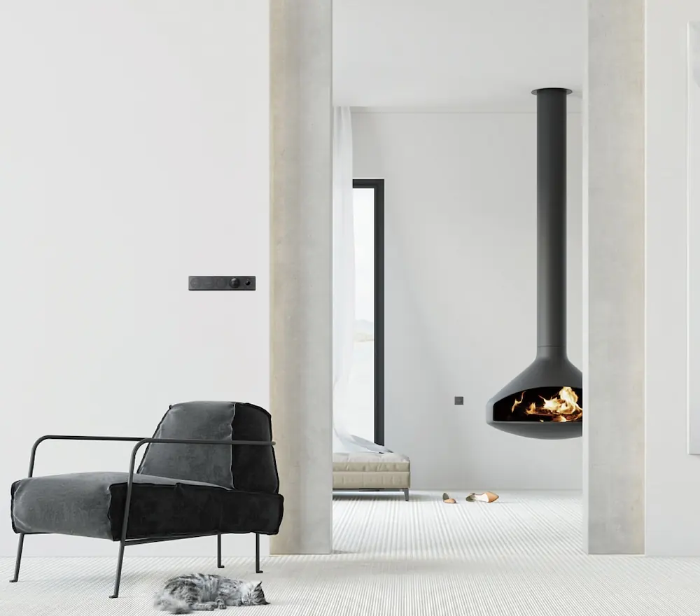 Minimal white living room with a slim Moorgen Chi Wing Lo control panel on the wall beside a hanging fireplace