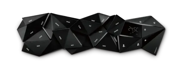 Moorgen Monaco Supercar smart panel in Mica Black: faceted black segments with small engraved labels and a temperature display
